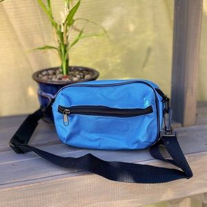 NEVER WORN. Unisex, blue, canvas, fanny pack/ lumbar pack.